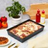 87dd011319ba63f1e9859dbe314006e4 Black Carbon Steel Bake Pan With A Raised Base for Oven